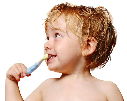Dentist Oakville - Burloak Centre Dentistry - A Child Brushing His Teeth